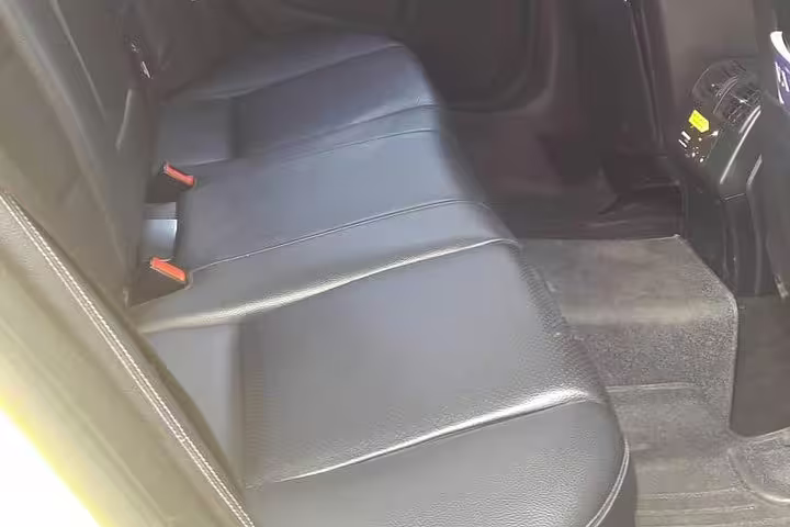 Spacious leather rear seats in private transfer vehicle from Meteora Kalabaka to Athens for a comfy trip