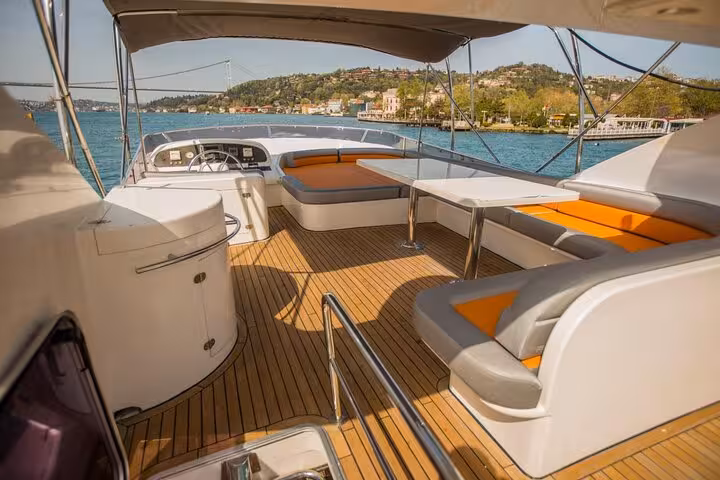 Spacious flybridge deck seating on private yacht, ideal for birthday or anniversary party cruise on Bosphorus