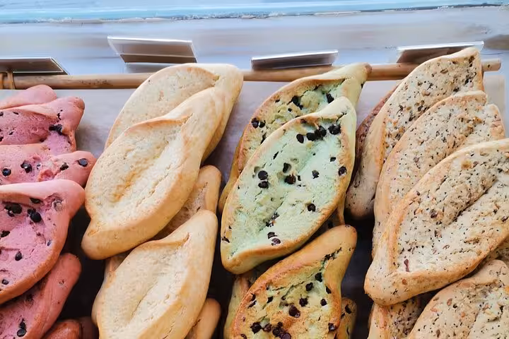 Assorted Provençal biscuits at a local market tasting, perfect pairing for Luberon wine tour flavors