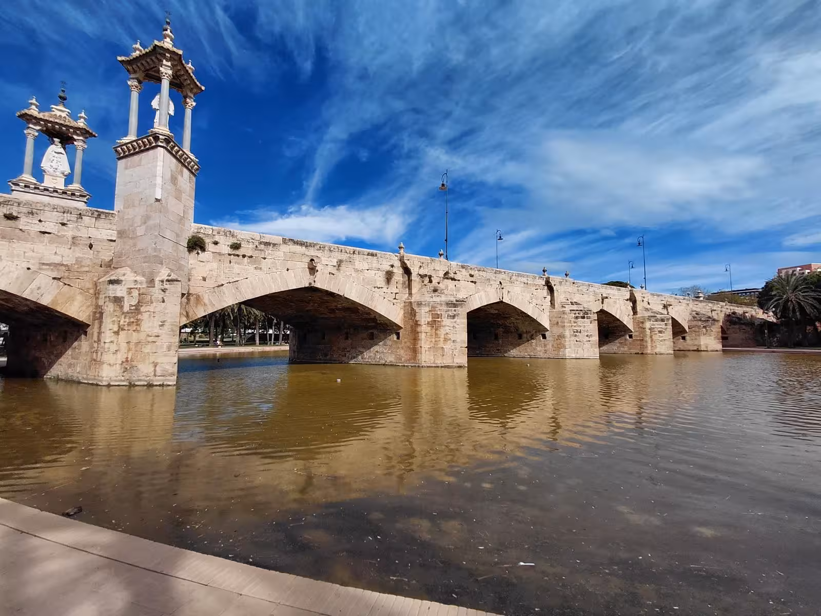 Puente de la Trinidad over the Turia River in Valencia, a stop on the audio guided City Quest scavenger hunt