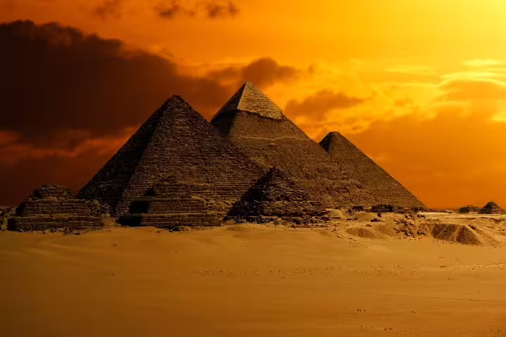 Pyramids of Giza at sunset, iconic desert view on Cairo day tour with Egyptian Museum and Coptic Cairo