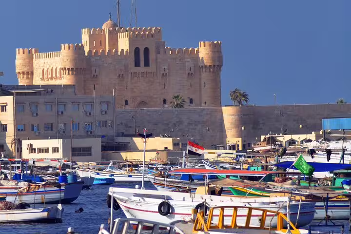 Qaitbay Citadel and Alexandria fishing boats at the harbor, private tour from Cairo to El Alamein and Alexandria