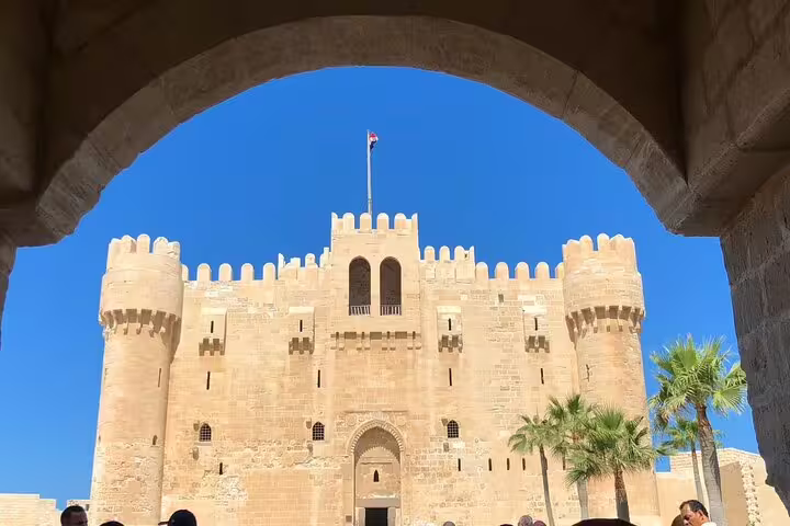 Qaitbay Citadel in Alexandria framed by arch, featured on 2-day Luxor to Cairo and Alexandria flight tour