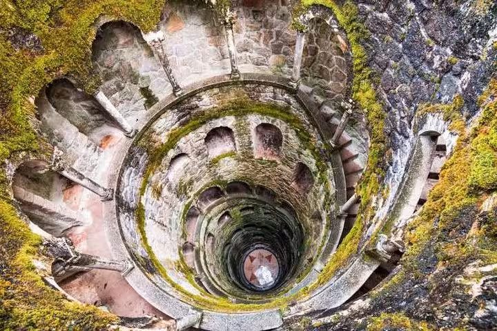 Quinta da Regaleira Initiation Well spiral staircase, a must-see stop on a Sintra self-drive tour