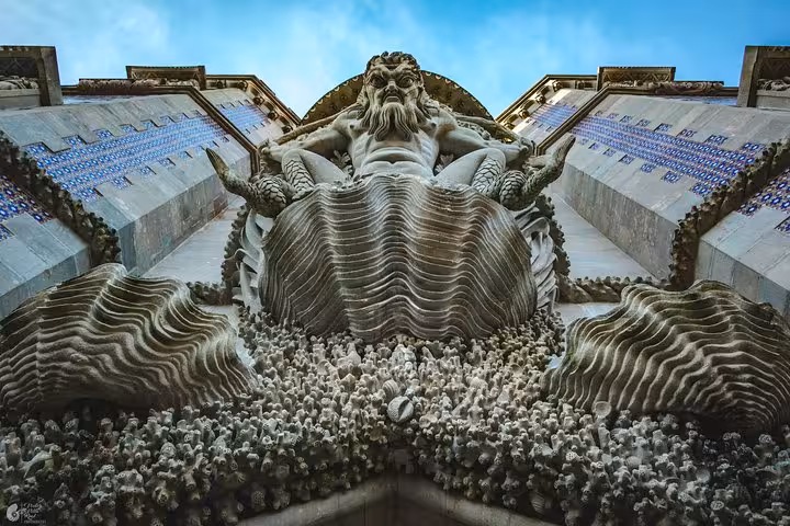 Quinta da Regaleira Initiation Well guardian sculpture, must-see stop on Sintra self-drive monuments tour