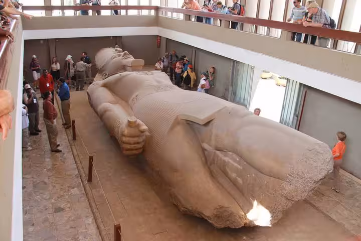 Colossal statue of Ramses II at Memphis museum on Cairo day tour to Pyramids, Saqqara and Dahshur