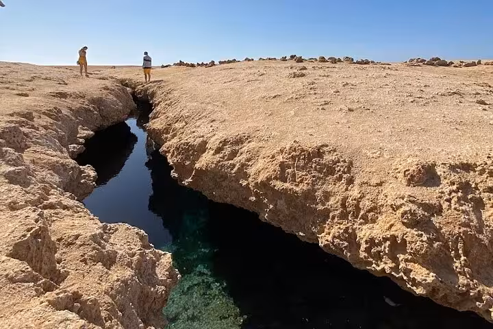 Ras Mohammed rocky coastline and lagoon view on White Island VIP cruise from Sharm El Sheikh with lunch