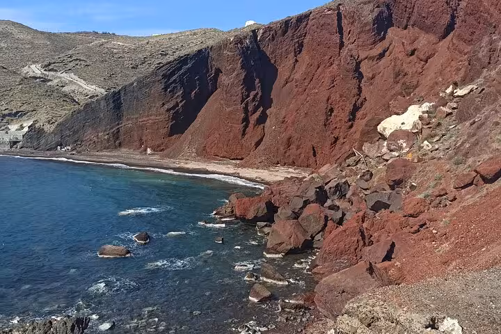 Red Beach Santorini coastline with volcanic cliffs and Aegean Sea, private 3-day tour with transfers included