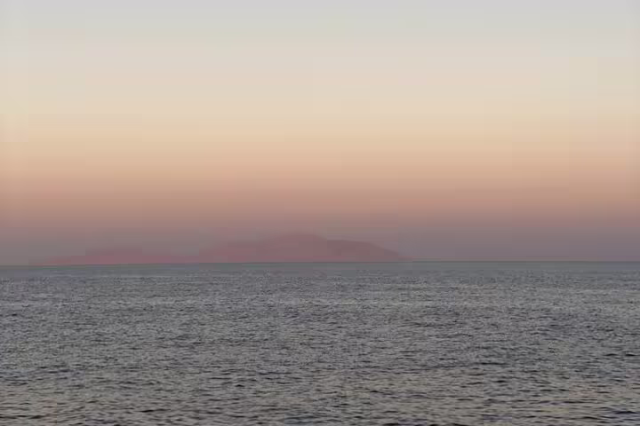Red Sea sunset horizon near Satayh Dolphin Reef, scenic view before snorkeling and dolphin spotting tour
