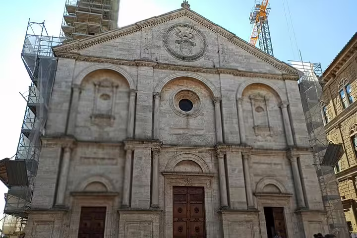 Renaissance church facade in Cortona or Montepulciano, a cultural stop on a private Tuscany art, wine and lunch day tour