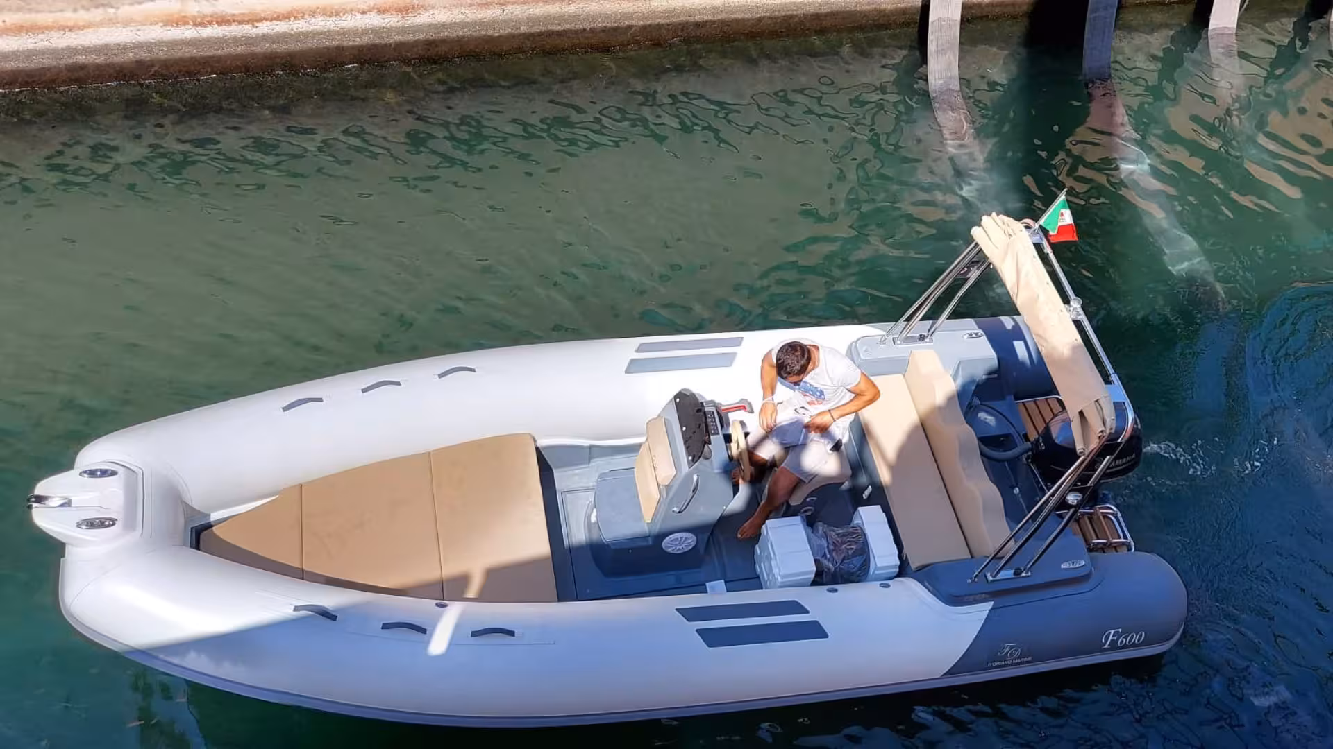 RIB boat ready for adventure on the clear waters of Arbatax, perfect for exploring Cala Mariolu and Cala Goloritzè.
