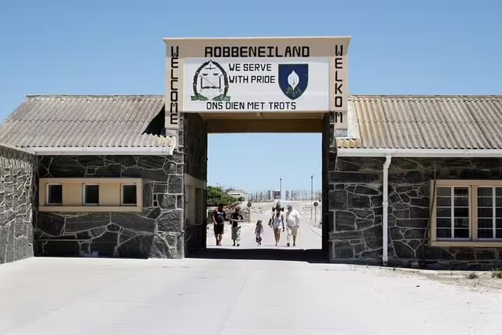 Entrance to Robben Island Museum, welcoming visitors with its iconic sign and historic significance.