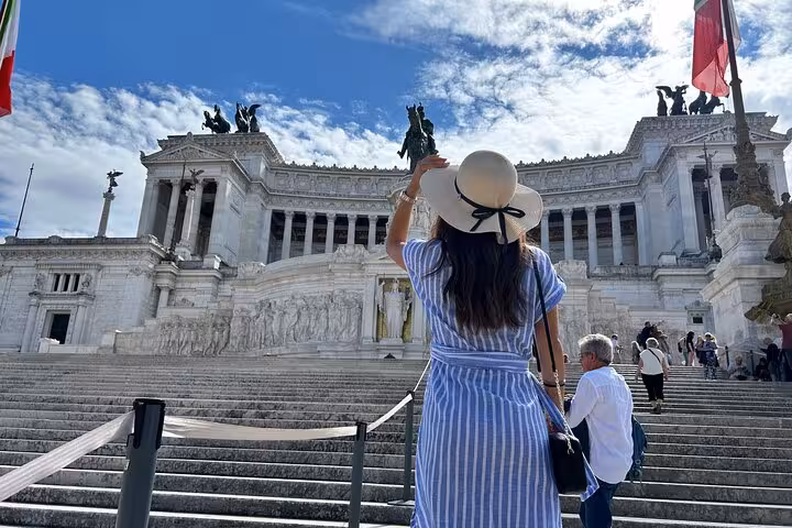 Admire the grandeur of the Altare della Patria in Rome's historic center during your culinary and sightseeing tour.