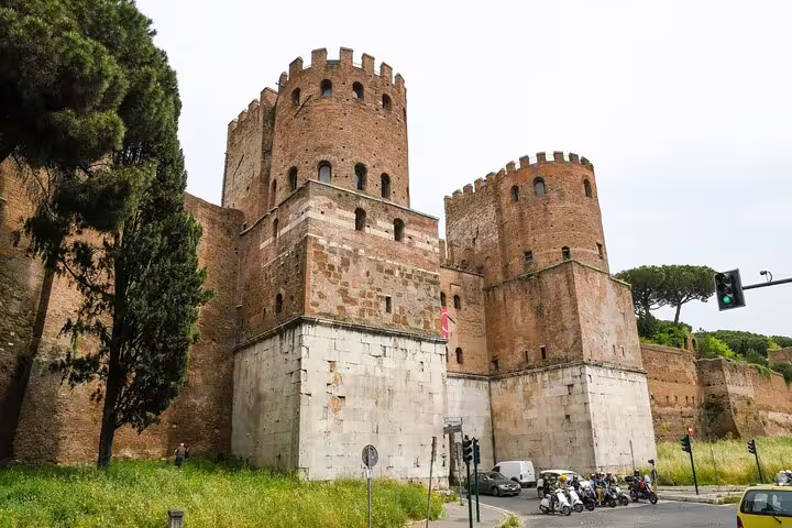 Medieval towers rising above the Aurelian Walls in Rome, landmark stop on a kids friendly walking tour of walls and undergrounds