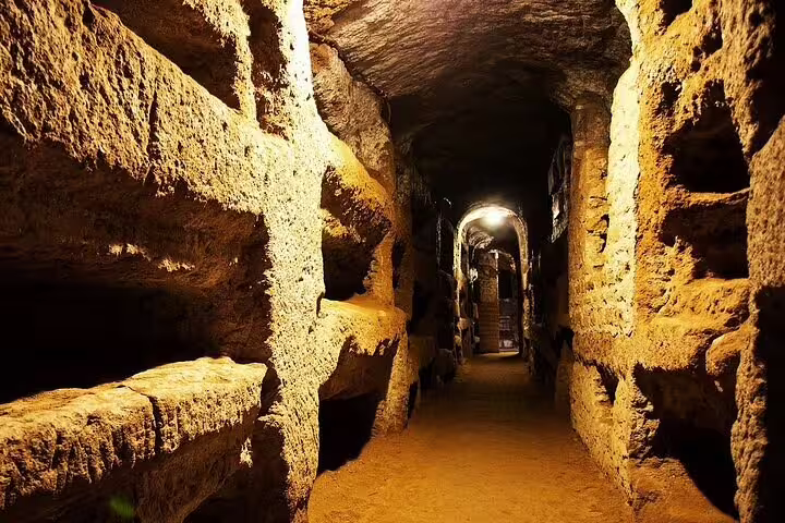 Ancient Roman catacombs tunnel in Rome, explored on a two days private chauffeured tour with skip the line tickets
