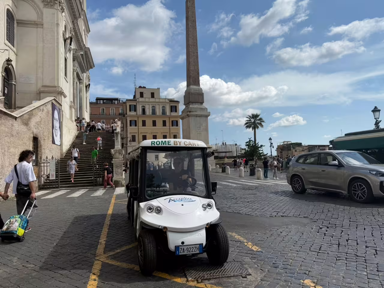 Golf cart tour in Rome at Piazza di Spagna near the Spanish Steps, ideal for an 8pm sunset ride
