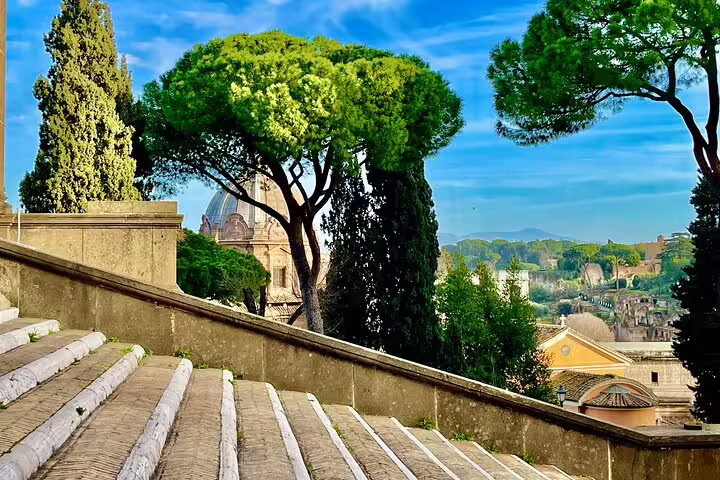 Sunlit steps and umbrella pines framing panoramic views of Rome’s historic center on a guided three day city tour