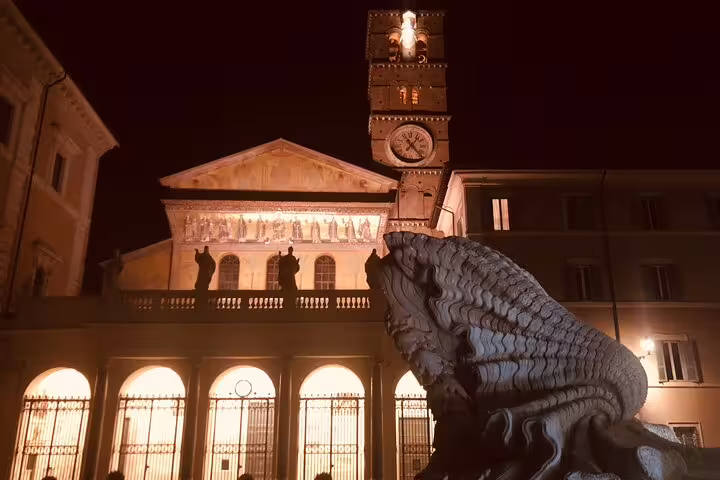 Basilica di Santa Maria in Trastevere and fountain lit at night on a Best of Rome by Night private chauffeured tour