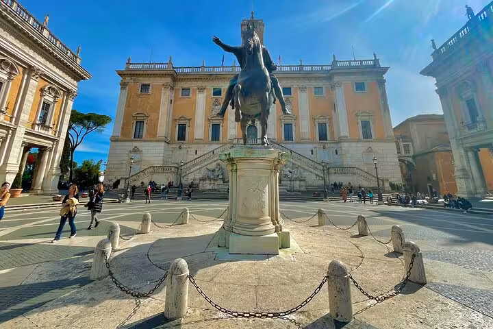 Historic piazza with grand palazzo and central equestrian statue visited on a Rome private chauffeured sightseeing tour