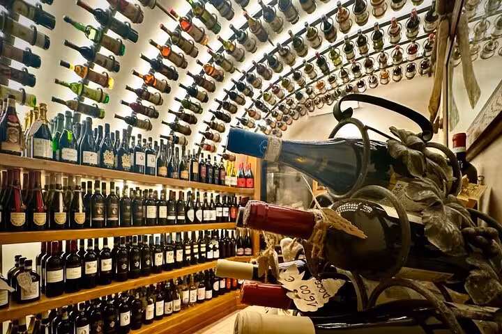 Curved wine cellar in Rome filled with Italian bottles, ideal for gourmet food tasting and paired wine on a private tour