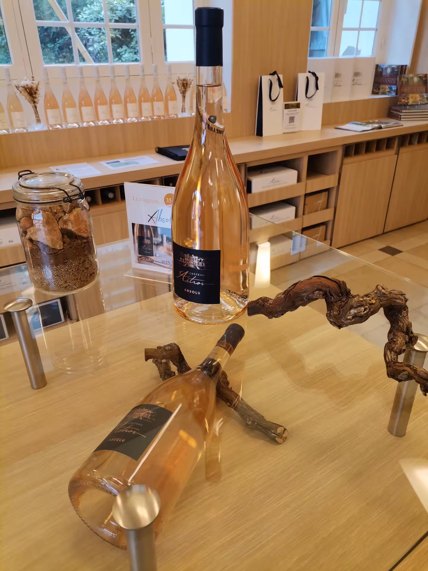 Rosé bottles at a Saint-Tropez winery tasting room, AOP Côtes de Provence wine tour experience