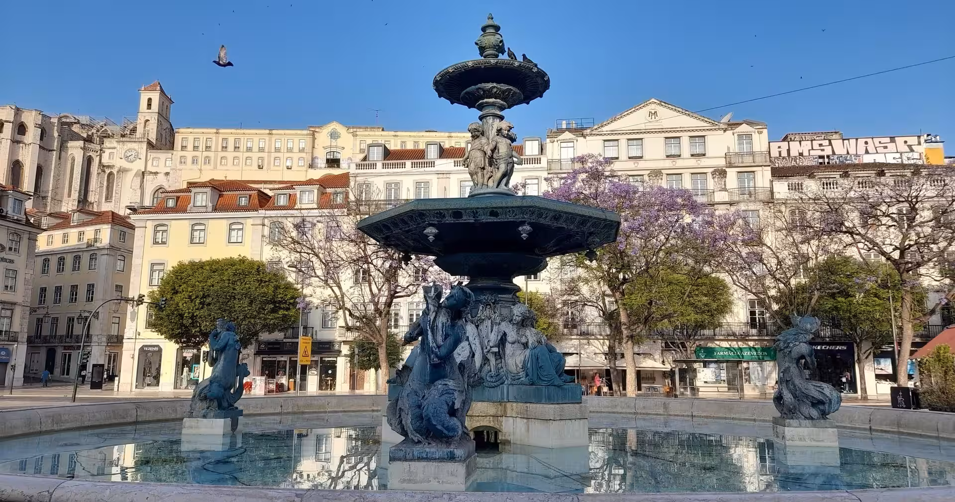 Rossio Square fountain in central Lisbon, a key stop on Lisbon & Sintra full-day historical highlights tour
