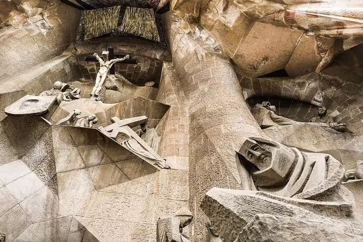 Intricate stone carvings in the Sagrada Familia highlight Gaudi's architectural brilliance on a private tour with skip-the-line tickets.