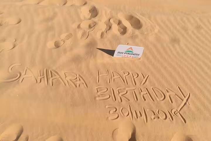 Sahara sand message in dunes at Bahariya, part of 5-day Black and White Desert and desert camping tour