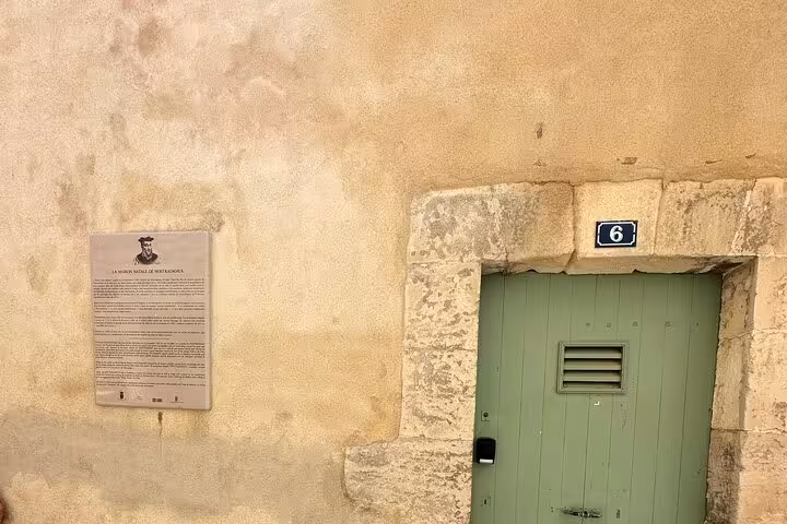Saint-Rémy-de-Provence historic doorway and plaque on stone wall, stop on private Marseille shore excursion day trip