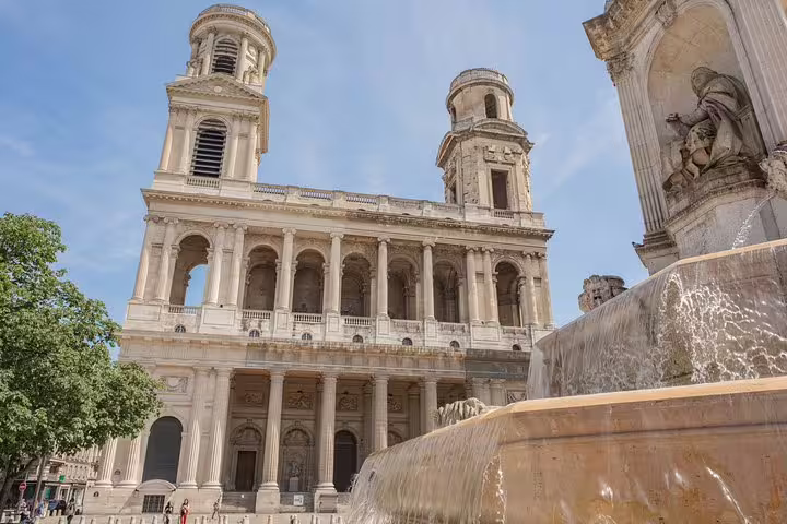 Stunning view of Saint-Sulpice Church and fountain in Paris, perfect for newcomers on a private city highlights tour.