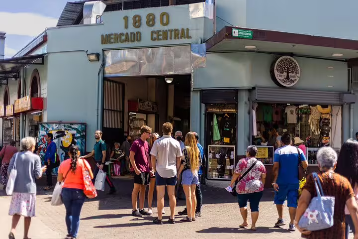Visitors explore the bustling Mercado Central in San Jose, a highlight of the San Jose By Night tour experience.