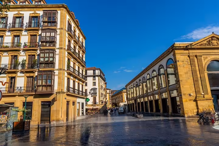 Charming street view of historic architecture in San Sebastian's old town, perfect for a guided city walk.