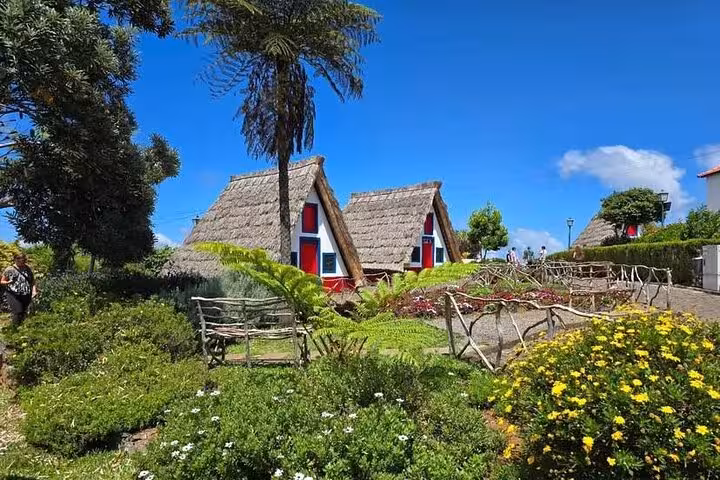 Traditional Santana thatched houses stop on Madeira East 4x4 tour from Pico do Areeiro to São Lourenço
