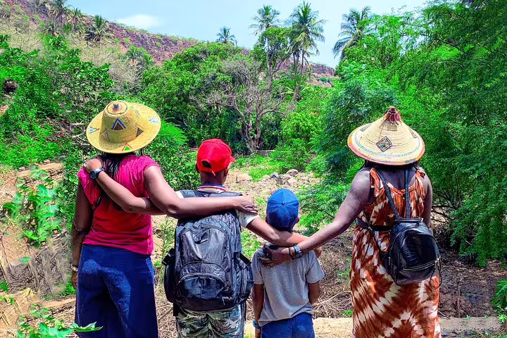 Family hiking the Calabaceira Valley trail on Santiago Island, Cape Verde, on a 4-hour guided tour to Cidade Velha