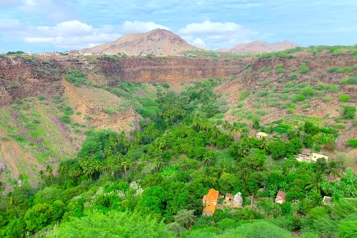 Panoramic Calabaceira Valley scenery on Santiago Island hike, lush palms and cliffs near Cidade Velha Cape Verde