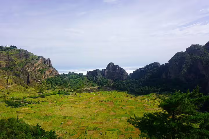 Breathtaking view of the Cova de Paúl Volcano Crater surrounded by lush landscapes on Santo Antão.