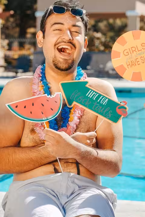 Guest enjoying a private pool day in Santorini, relaxing by the water with caldera sunset vibes