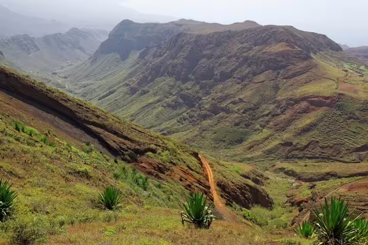 Lush green valleys and rugged mountains in São Nicolau, perfect for 4x4 adventures and nature exploration.