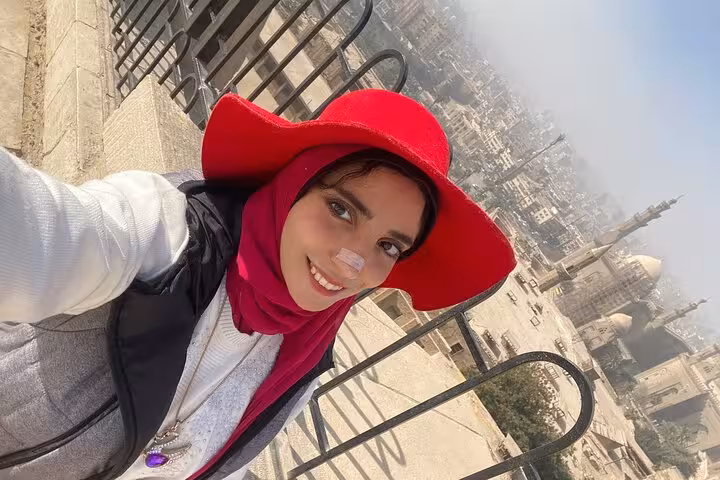 Traveler selfie overlooking Cairo on Saqqara Dahshur Memphis day tour, supporting stray dogs and cats donation