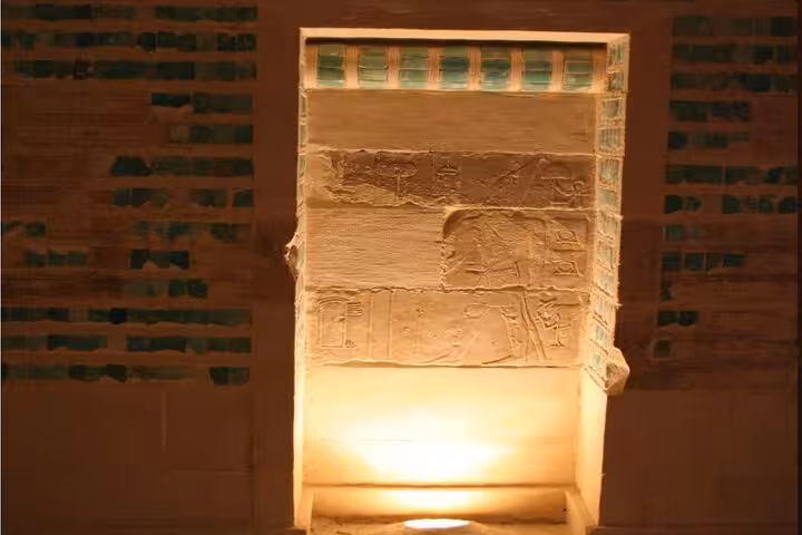 Ancient Egyptian hieroglyph relief inside Saqqara complex on Memphis and Saqqara tour with pyramid entry