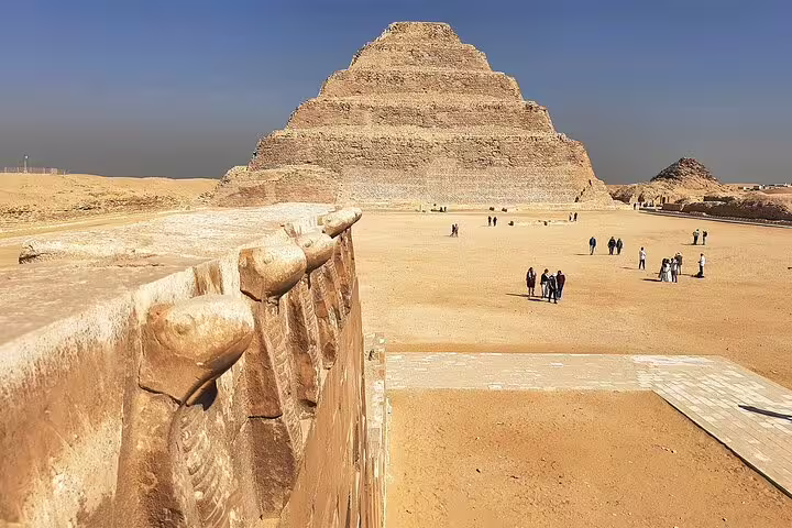 Saqqara Step Pyramid with carved stone wall, on private tour from Cairo visiting Memphis and Giza Pyramids