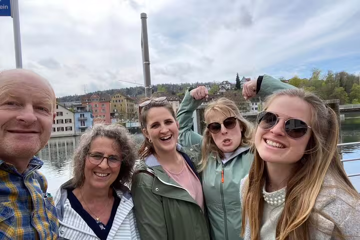 Group selfie by the Rhine in Schaffhausen during a self-guided scavenger hunt and sights walking tour