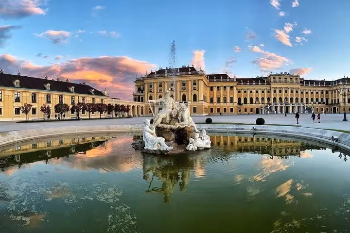 Schonbrunn Palace fountain in Vienna at sunset, pickup point for Vienna to Prague private transfer via Cesky Krumlov