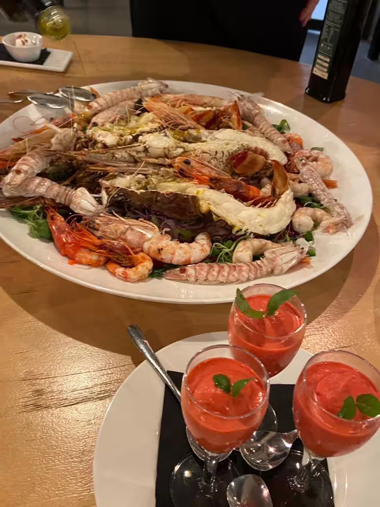 Seafood platter with prawns and scampi plus tomato gazpacho shots at chef Angelo Lanaro’s home restaurant