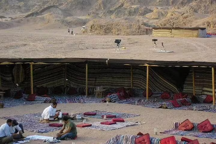 Sharm El Sheikh desert stargazing camp with Bedouin tent seating and dinner show setup after ATV quad bike ride