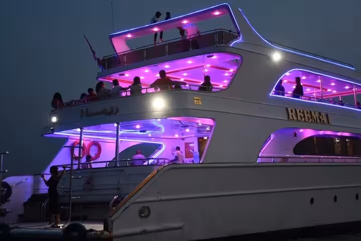 Illuminated yacht at night for Sharm El Sheikh evening oriental dinner cruise with belly dance show onboard