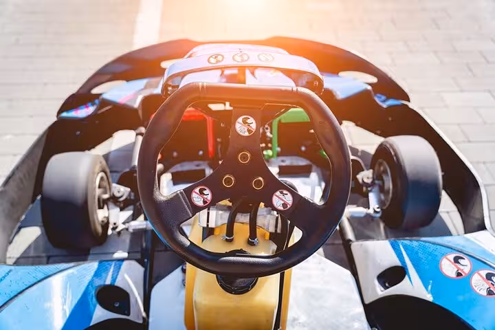 Steering wheel view of a go-kart at Ghibli Raceway, Sharm El-Sheikh day trip racing experience