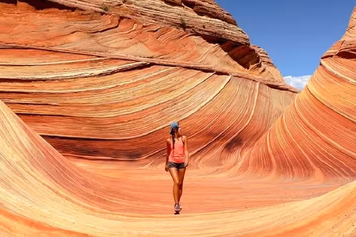 Traveler hikes through Sinai Canyon on Sharm El-Sheikh jeep tour to Blue Hole and Dahab day trip