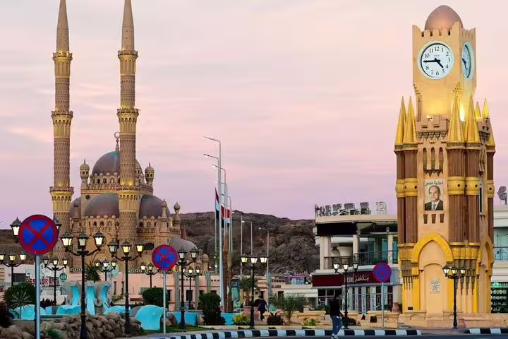 Sharm El Sheikh Old Town clock tower and Al Sahaba Mosque at sunset on VIP city sightseeing tour with Egyptologist
