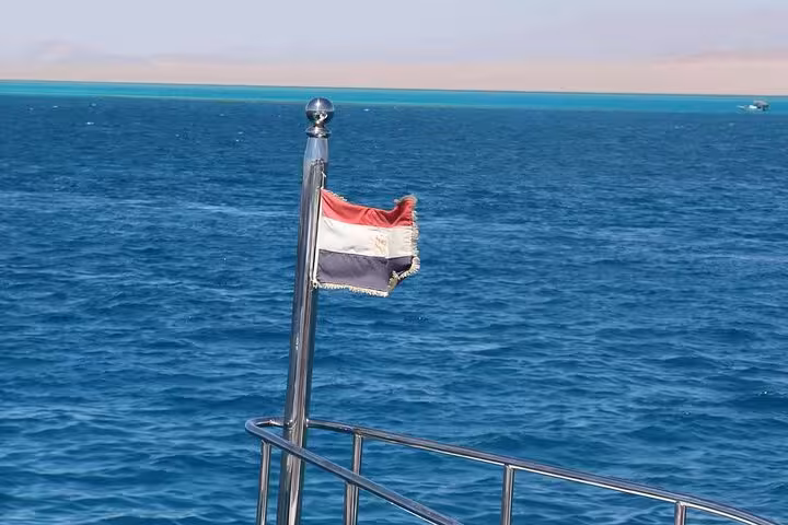 Egyptian flag on a cruise boat in the Red Sea near Ras Mohamed, heading to White Island snorkeling tour
